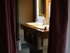 Double sink in bathroom with a view of the valley below