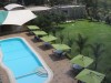Room overlooked pool and outdoor eating